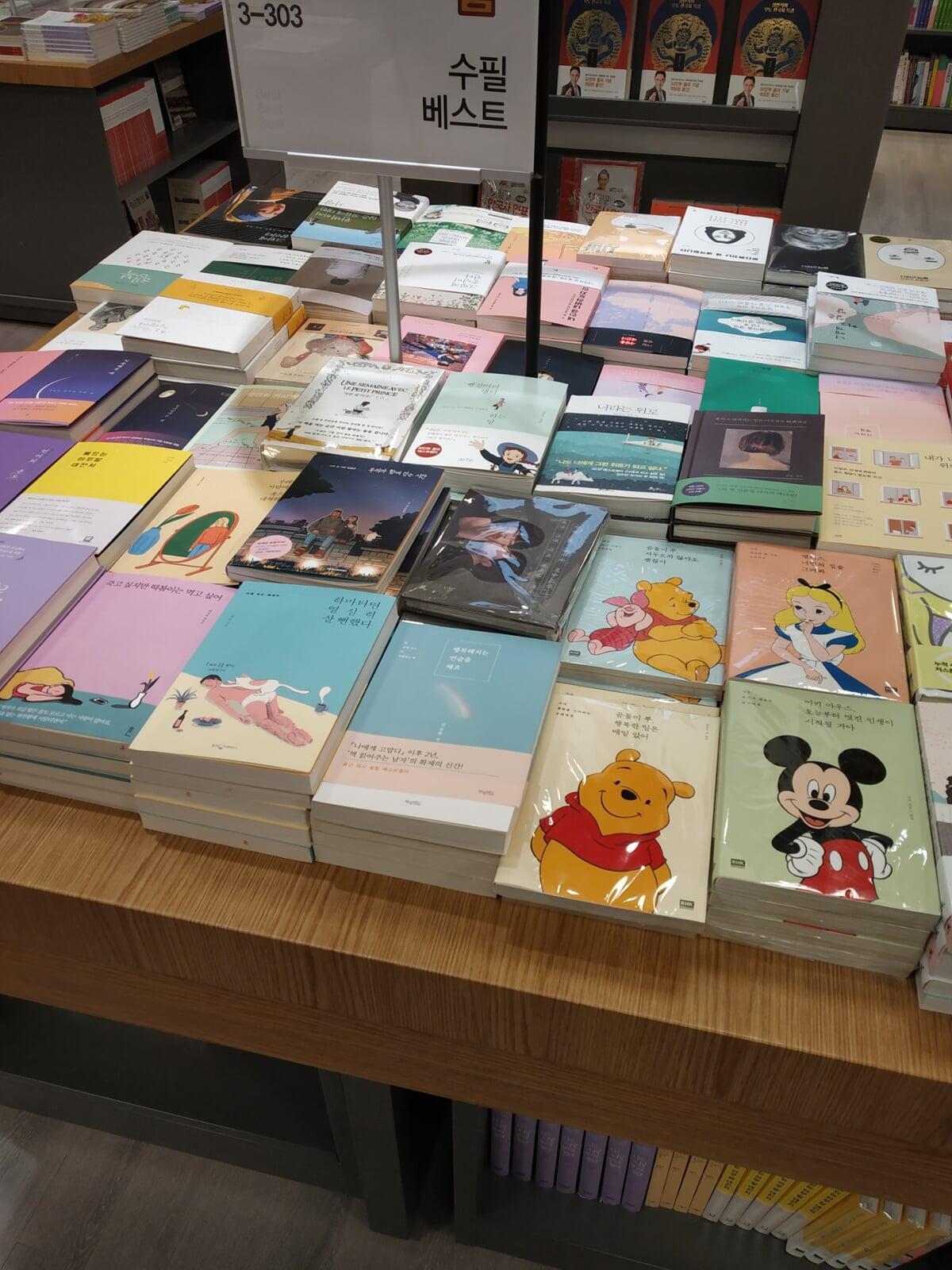Books placed on a table in a bookstore